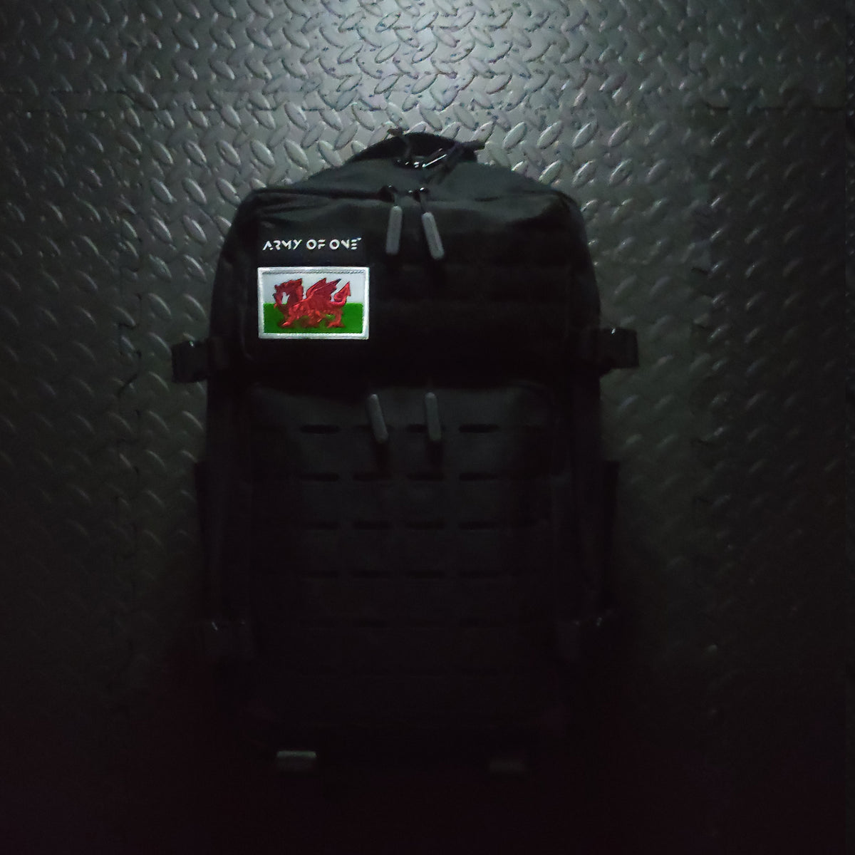BLACK 45 LITRE ARMY OF ONE BACKPACK WITH VELCRO WELSH PATCH ATTACHED